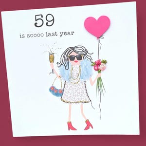 May include: A white card with a black and white illustration of a woman wearing sunglasses, a blue fur coat, a leopard print dress, red shoes, and holding a glass of champagne and a bouquet of pink flowers. The card also has a pink heart balloon and the text "59 is soooo last year".