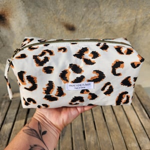 Leopard quilted toiletry bag