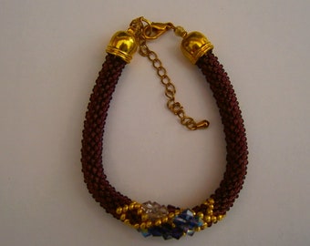 Crocheted bracelet in rockery beads and SWAROVSKI crystal tops