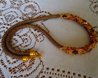 Crocheted necklace in rockery beads and SWAROVSKI crystal tops, autumn colours