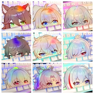 May include: Nine colorful anime-style character stickers, each featuring a close-up of eyes and hair, peeking over a white keyboard with illuminated keys. The stickers have a rainbow-like effect.