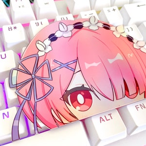 May include: A pink and white anime character with red eyes and a bow in her hair. The character is on a white keyboard with keys labeled 'ALT' and 'FN'.