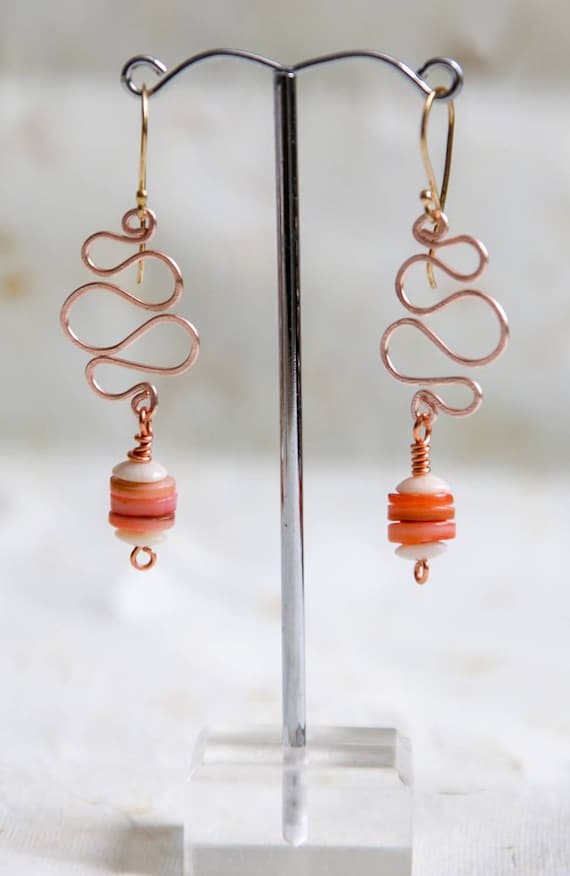 Pink shell and hammered rose gold coloured copper earrings on oxidised sterling silver earwires.