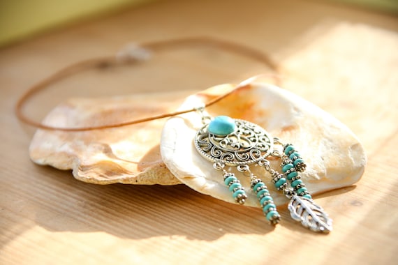 Quintessential Boho Necklace. Various metals, natural turquoise beads, sterling silver findings.