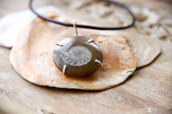 Sterling silver and ammonite pendant on leather choker