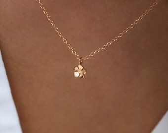 Necklace and mini gold-plated flower pendant