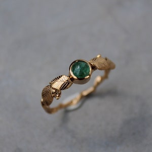 Leaves and emerald ring