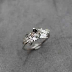 Silver flower and leaves ring