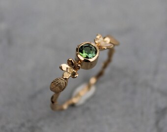 Bague fleurs et feuilles minimalistes et tourmaline verte
