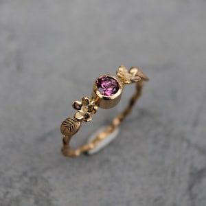 Minimalist flower and leaf ring with pink tourmaline