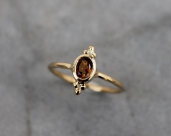 Gold-plated and orange tourmaline ring