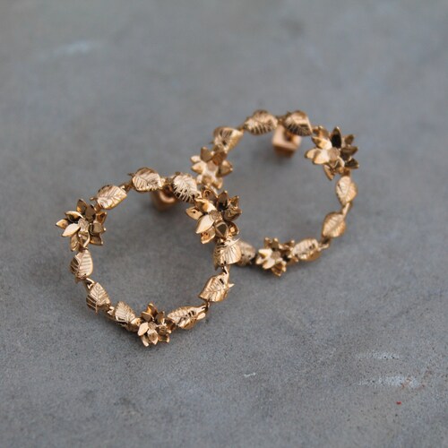 Minimalist leaf shops earrings and lotus flowers