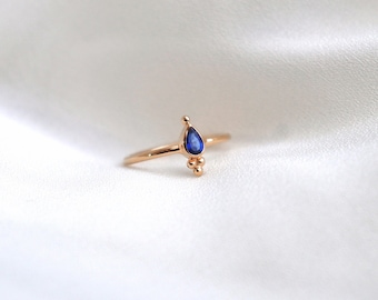 Ball and sapphire ring