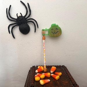 Contenitore per caramelle vintage per feste di Halloween con zucca di Halloween che gira