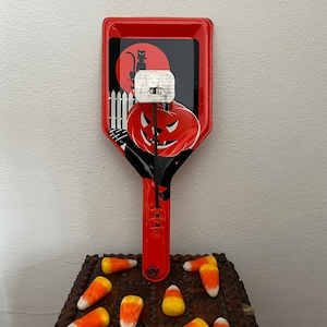 Vintage Halloween U.S. Metal Toy Tin Pan Clanger Noisemaker with Cat on Fence and Evil Jack-O&#39;-lantern