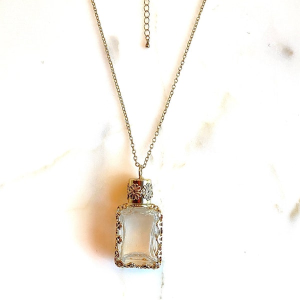 Vintage Clear Glass Bottle necklace with Gold tone metal wrpping