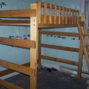 Heavy duty full  size loft bed 73 inches tall