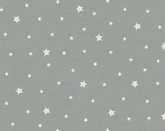 Christmas patchwork fabric representing small white stars on a gray background. Scandi 23 collection distributed by Makower. 100% cotton.