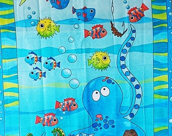 Panneau de tissu enfants représentant des animaux de la mer avec un design naïf. 100% coton.