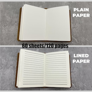 May include: Two open notebooks with brown covers. The top notebook has plain white pages, labeled "PLAIN PAPER". The bottom notebook has lined pages, labeled "LINED PAPER". The text "60 sheets/120 pages" is in the center.