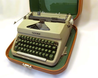 1960 Facit TP1 portable typewriter with leather-look case