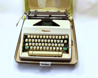 Olympia SM9 portable typewriter with case built in 1965