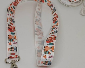 White badge lanyard with foxes and owlsFree shipping