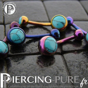 May include: Multiple turquoise belly button rings with a rainbow anodised finish. The rings are made of surgical steel and feature a round turquoise stone.