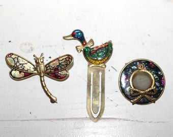 golden brooches and bookmarks