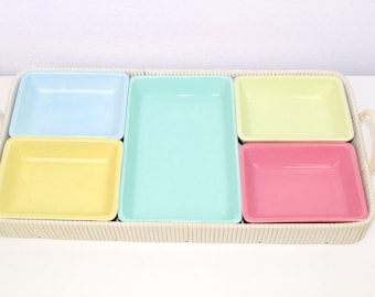 Vintage tray with pastel-colored ceramic bowls