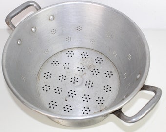 Vintage tinplate sieve