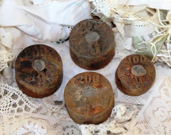 Four weights 200g and 100g with special patina