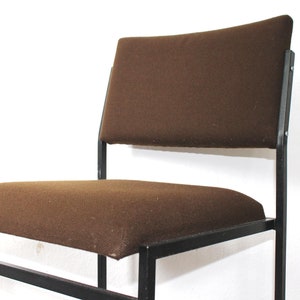 Designer loft chair with tubular steel frame
