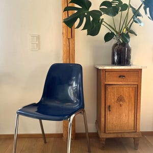 May include: A set of three ceramic mugs with a speckled, matte finish. The mugs are in shades of cream, light gray, and dark gray. Each mug has a simple, minimalist design, perfect for coffee or tea.