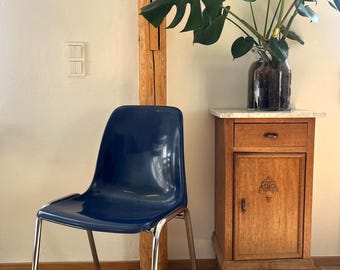 Vintage stacking chair in a beautiful blue with chrome legs