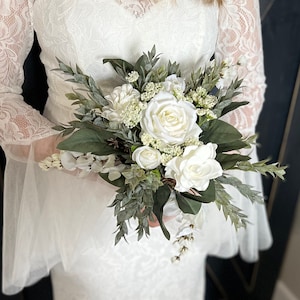 Elegant white bouquet with Eucalyptus and greenery, bridesmaid bouquet, wedding bouquet