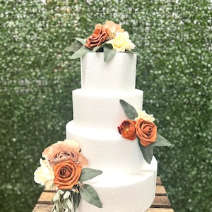 Terracotta, cream, and taupe Cake flower arrangements, small flower clusters, flower accents