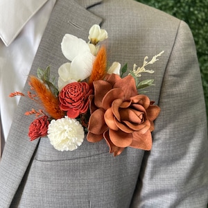 Burnt orange, rust and cream pocket boutonniere, pocket flowers, grooms wedding flowers