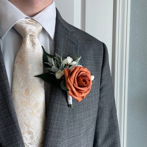 Terracotta rose Boutonnière, burnt orange boutonnière, fall Men’s wedding flower