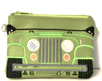 machine embroidered 4 x4 jeep on lime green faux leather with zipper closure and adjustable cross body strap.