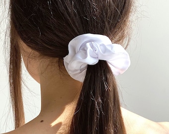 Silk scrunchie available as a set. It has a good stretchy and pleasant to the touch.