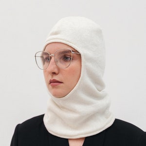 Balaclava hat with fleece lining for cold winter is a universal set of hat and scarf in one suitable for everyone. White
