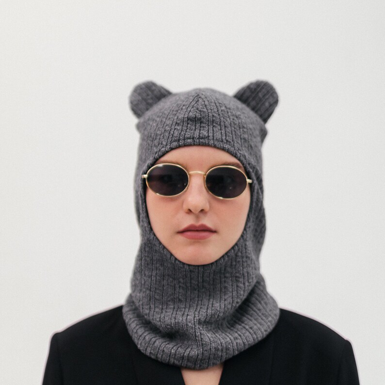 Balaclava hat with fleece lining for cold winter is a universal set of hat and scarf in one suitable for everyone. Gray with ears
