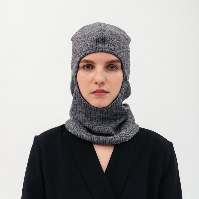 Balaclava hat with fleece lining for cold winter is a universal set of hat and scarf in one suitable for everyone. Gray