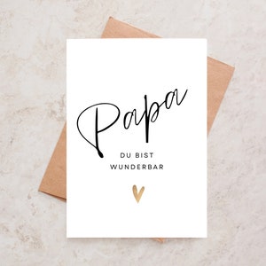 Karte zum Vatertag, Papa du bist wunderbar, mit goldfarbenem aufgemalten Herz und Kalligrafie-Schrift, Postkarte Din A6 mit Umschlag.