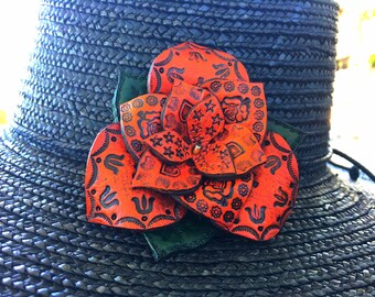 Tooled Leather Flower Clips for your hair, hat or clothing.
