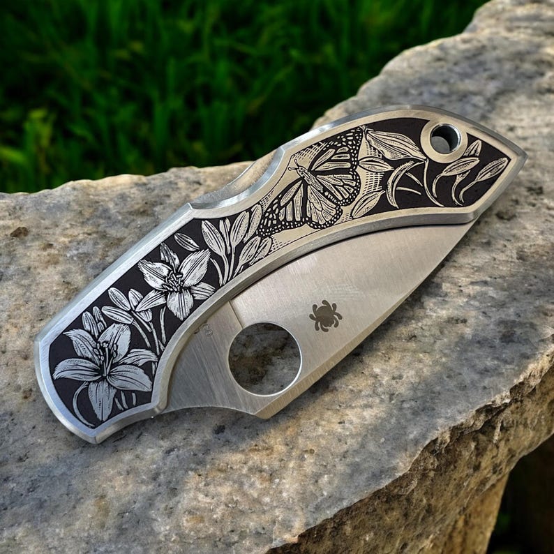 Spyderco Dragonfly - Stainless Steel with Intricately Engraved Lillies and Monarch Butterfly - Position Right Angle