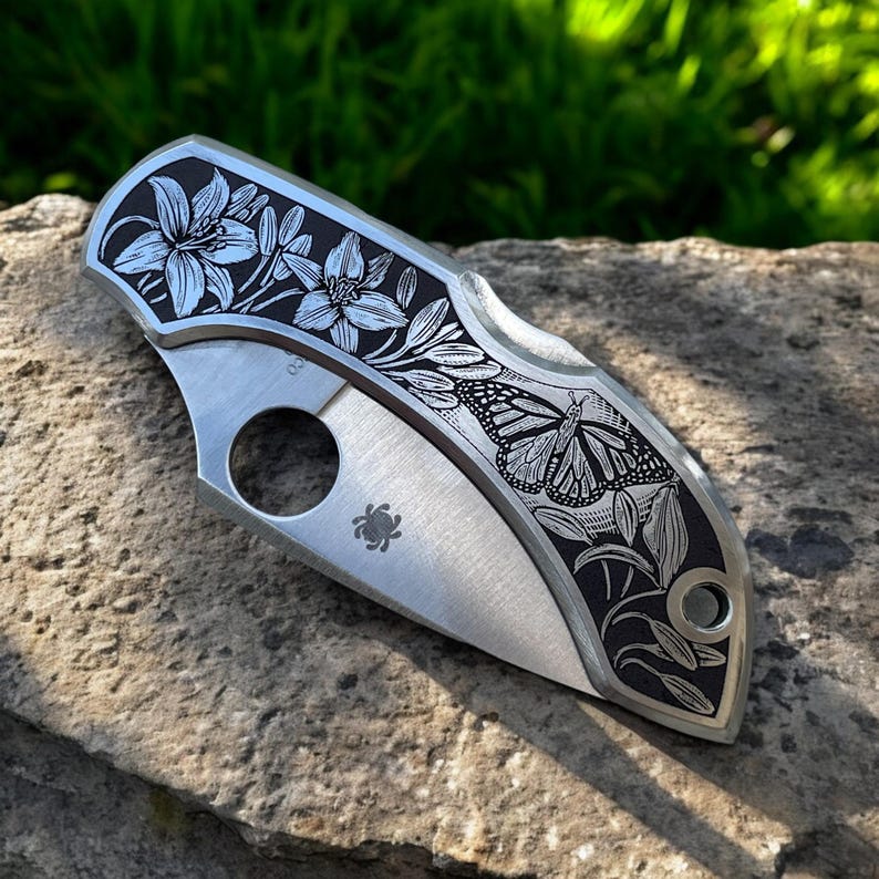 Spyderco Dragonfly - Stainless Steel with Intricately Engraved Lillies and Monarch Butterfly - Position Left Angle