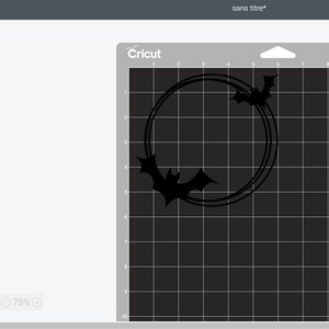 May include: A black and white design of two bats flying in a circle on a black cutting mat. The design is ready to be cut using a Cricut machine.