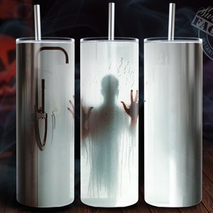 Puede incluir: Tres vasos de acero inoxidable con diferentes dise&ntilde;os. El primer vaso tiene un dise&ntilde;o de cabezal de ducha, el segundo vaso tiene una silueta de una persona en la ducha, y el tercer vaso est&aacute; en blanco.